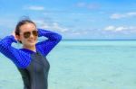 Asian Teen Girl Is Relax In The Sea During Travel To Ko Lipe, Thailand Stock Photo