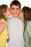 Teenage Girls Kissing Stock Photo