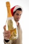 Christmas Young Guy Holding Wine Stock Photo