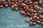 Coffee Beans On The Wooden Floor Stock Photo