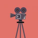 Movie Camera On Tripod Stock Photo