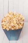 Blue Box Full Of Sweet And Tasty Popcorn Stock Photo