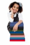 Happy School Girl With Stack Of Books Stock Photo