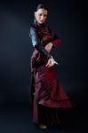 Young Flamenco Dancer In Beautiful Dress On Black Background Stock Photo