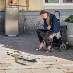 Lady Playing A Saw In Krakow Stock Photo