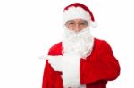 Santa Claus Pointing Away Over White Stock Photo