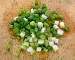 Green Onion On The Wooden Background Stock Photo