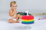 Baby Girl Celebrating Her First Bithday With Gourmet Cake And Ba Stock Photo