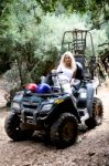 Female Sitting On ATV Stock Photo