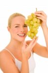 Woman Holding Grapes Stock Photo