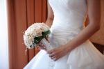 Bride Holding Wedding Rose Bouquet Stock Photo