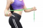 Woman In Sport Bra Measuring Her Body With Tape Isolated On Whit Stock Photo