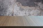 Top Of Wood Table On Old Concrete Wall Background Stock Photo