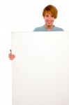 Teenage Boy Holding Blank Board Stock Photo