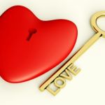 Heart And Key With Love Text Stock Photo