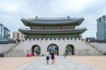 Seoul, South Korea - July 17: Tourists Taking Photos Of The Beautiful Scenery Around Gyeongbokgung Palace On July 17, 2015 In Seoul, South Korea Stock Photo