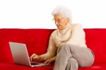 Elderly Woman With Laptop Stock Photo