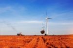 Truck Tractors Are Plowing Tillage With The Blue Sky Stock Photo