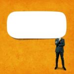 Businessman With Speech Bubble Stock Photo