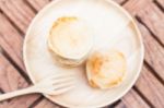 Mini Pies On Wooden Plate Stock Photo