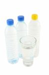 Drinking Water In Bottles And Glass Stock Photo