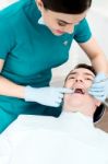 Patient Getting Dental Checkup Stock Photo