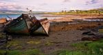 Two Wrecked Boats At Salen Isle Of Mull Stock Photo