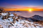 Winter Landscape With Sunset And Foggy In Deogyusan Mountains, South Korea Stock Photo