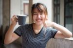 Portrait Of Thai Adult Beautiful Girl Drinking Coffee Stock Photo