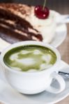 Green Tea And Cheesecake Stock Photo