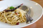 Spaghetti With Ham , Bacon, Chilli And Basil Stock Photo