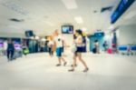 Blurred Tourist In The Airport Stock Photo