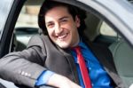 Portrait Of Handsome Guy Driving His Car Stock Photo