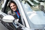 Portrait Of Handsome Guy Driving His Car Stock Photo