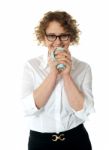 Female Executive Drinking Coffee Stock Photo