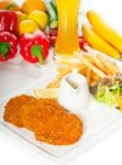 Classic Milanese Veal Cutlets And Vegetables Stock Photo