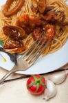 Italian Seafood Spaghetti Pasta On Red Tomato Sauce Stock Photo