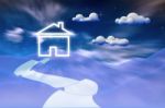 House In Clouds Stock Photo