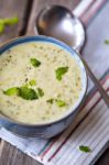 Bowl Of Broccoli And Cheddar Cheese Soup Stock Photo