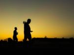 Silhouette Teen Age Run Together  Track Stock Photo