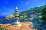 Haedong Yonggungsa Temple And Haeundae Sea In Busan, South Korea Stock Photo