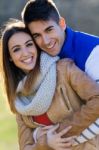 Young Couple In The Park Stock Photo