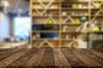 Selected Focus Empty Brown Wooden Table And Coffee Shop Or Resta Stock Photo