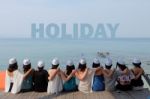 Women Friends Sit Hug Together Look Holiday Sea Sky Stock Photo