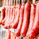 Home Made Meat Salami Sausage At Street Market Hanging In Line U Stock Photo