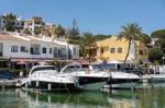 Boats Moored In Cabo Pino Harbour Stock Photo