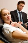 Psychiatrist Examining A Female Patient Stock Photo