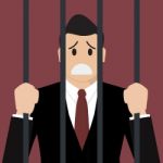 Businessman In Prison Stock Photo