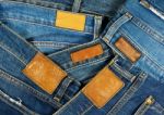 Jeans With Label Texture And Background Stock Photo