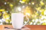 Cup Of Coffee On Wooden Stock Photo